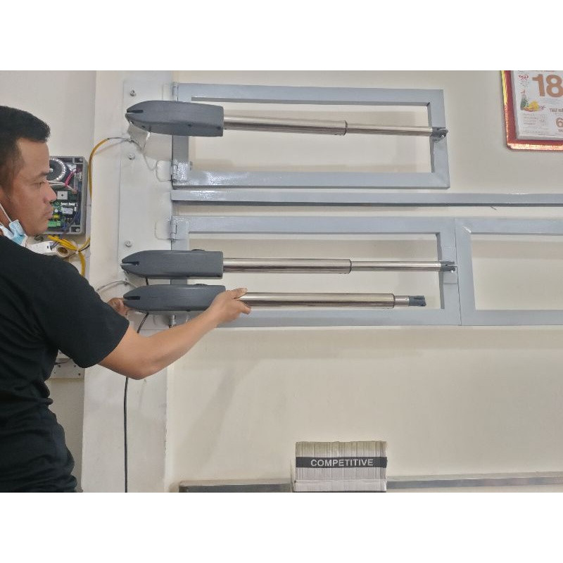 Lắp đặt motor tay đòn YH Trung quốc 700kg/2 cánh